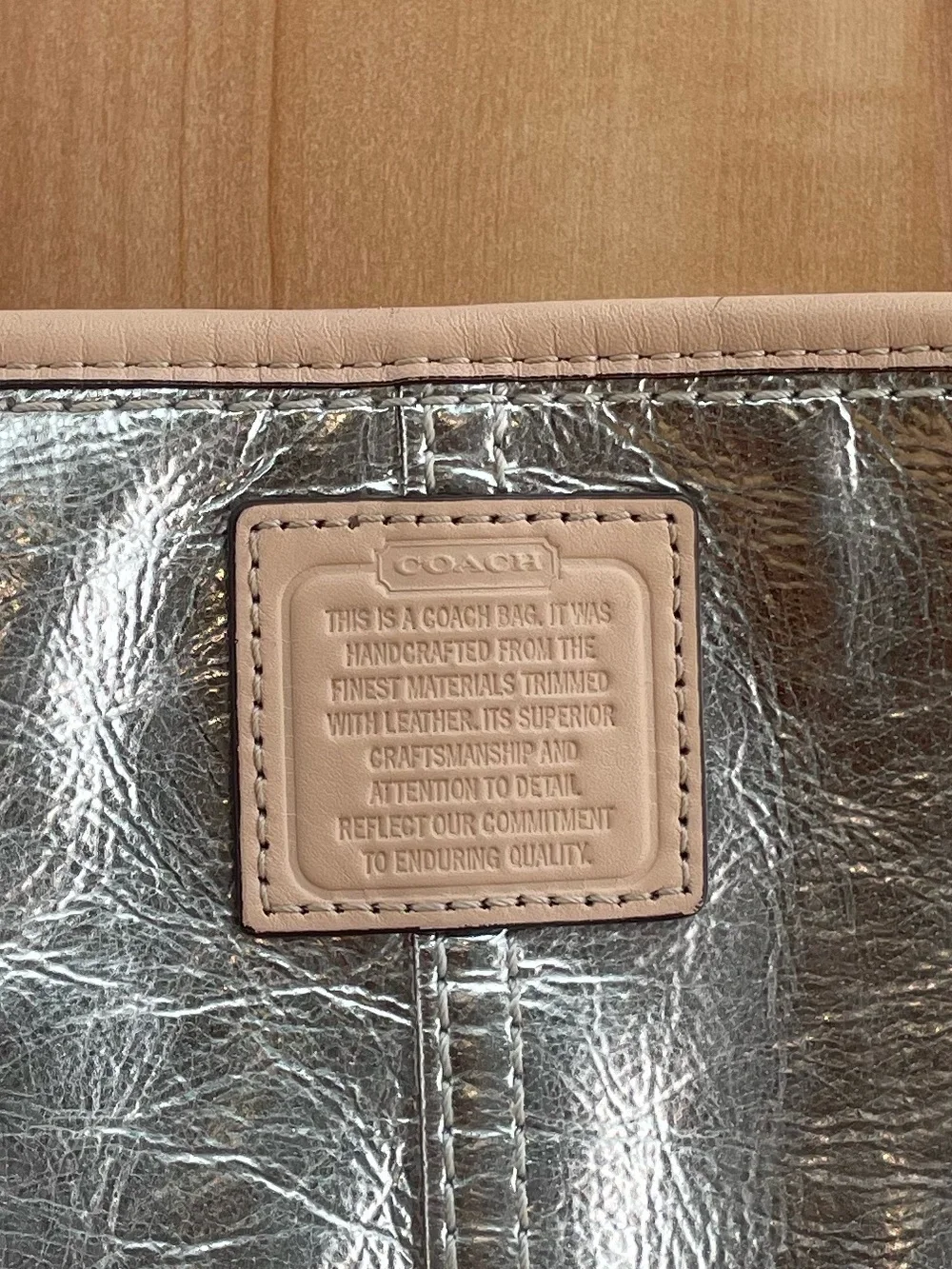 Coach wristlet metallic